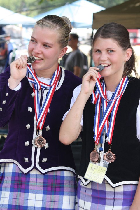 Gillian and Alicia enjoying a taste of medal